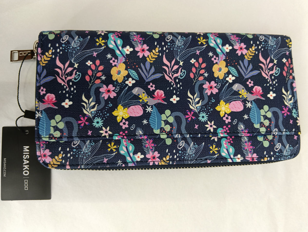 Monedero con tejido estampado floral,con fondo azul oscuro y motivos de flores y hojas de varios colores