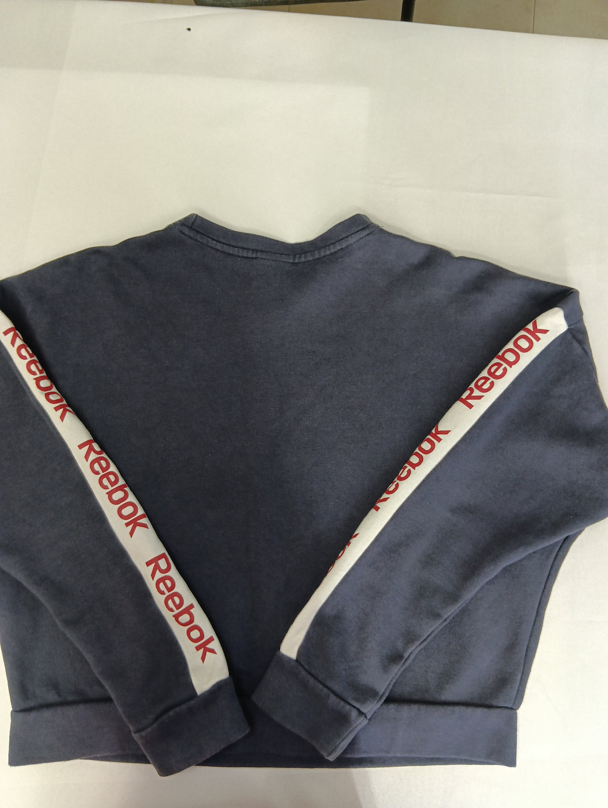 Sudadera de mujer color azul marca Reebok